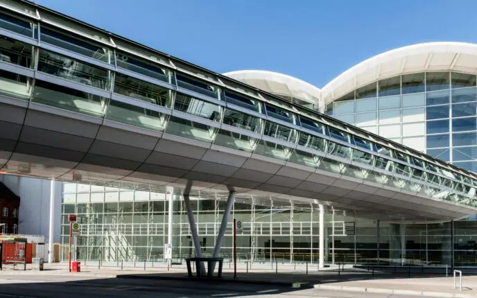 A large building with many windows and a walkway